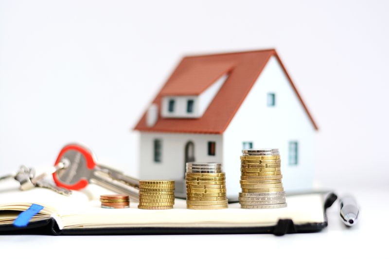 house with keys and coins